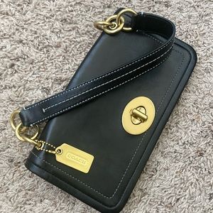 Coach black leather turn lock clutch with handle